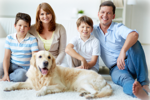 Complete Care Systems - Leading Pasco County Carpet Cleaners - Happy Family with Dog Image